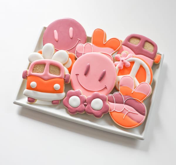 Groovy 1970's inspired sugar cookies on a square platter.