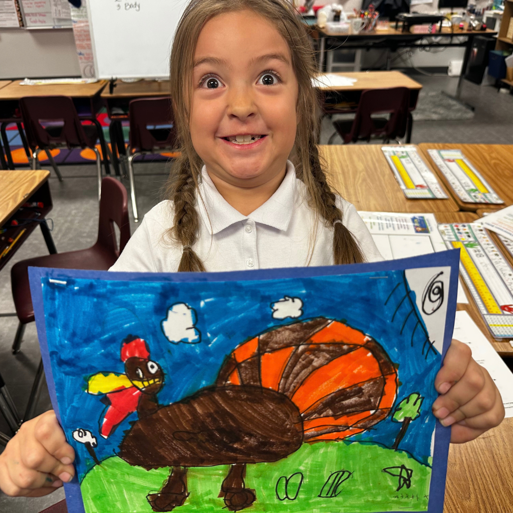 Child smiling with Drawing