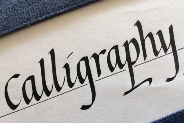 The word calligraphy written in italic script